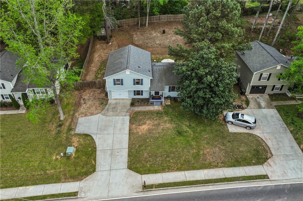 3990 Pine Mountain Road Northwest Kennesaw, GA 30152 - Photo 28 of 32 an aerial view of a house with garden space and street view