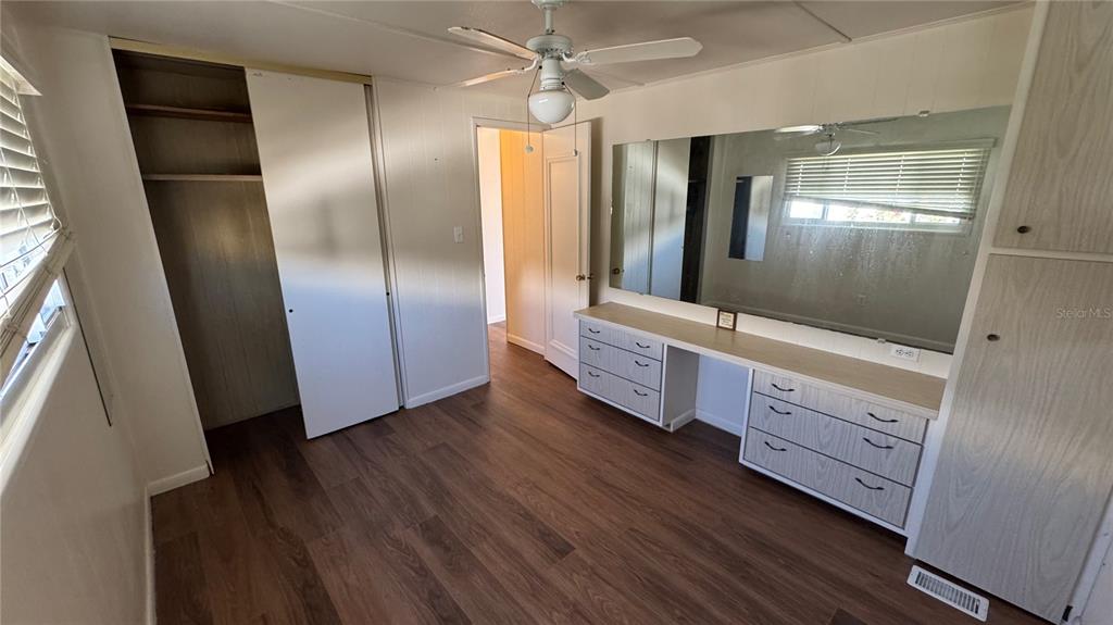 61 5th Avenue Venice, FL 34285 - Photo 11 of 35 a view of a hallway with wooden floor