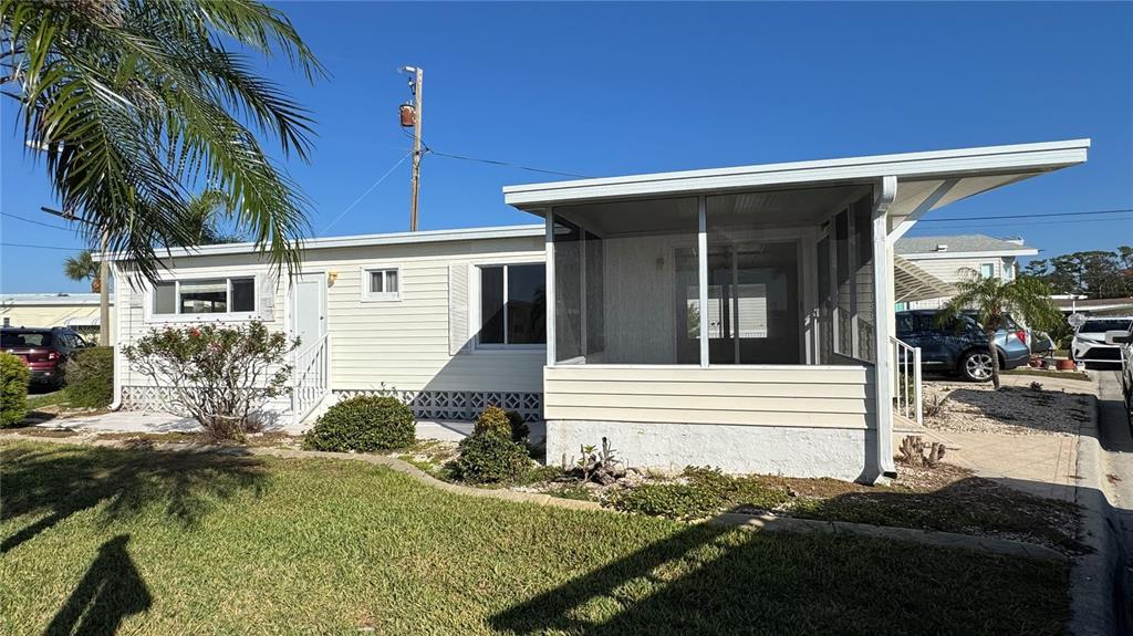 61 5th Avenue Venice, FL 34285 - Photo 16 of 35 a view of a house with a yard