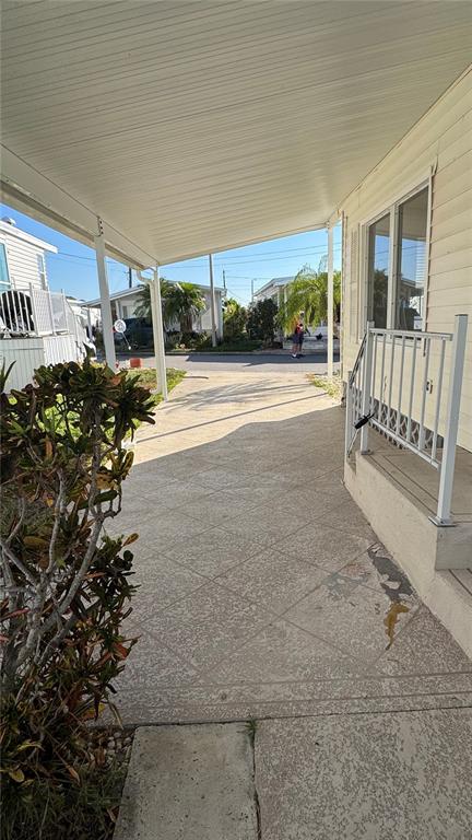 61 5th Avenue Venice, FL 34285 - Photo 19 of 35 a view of a porch with furniture and garden