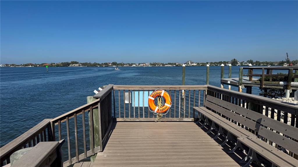 61 5th Avenue Venice, FL 34285 - Photo 24 of 35 a view of a balcony with wooden floor and fence
