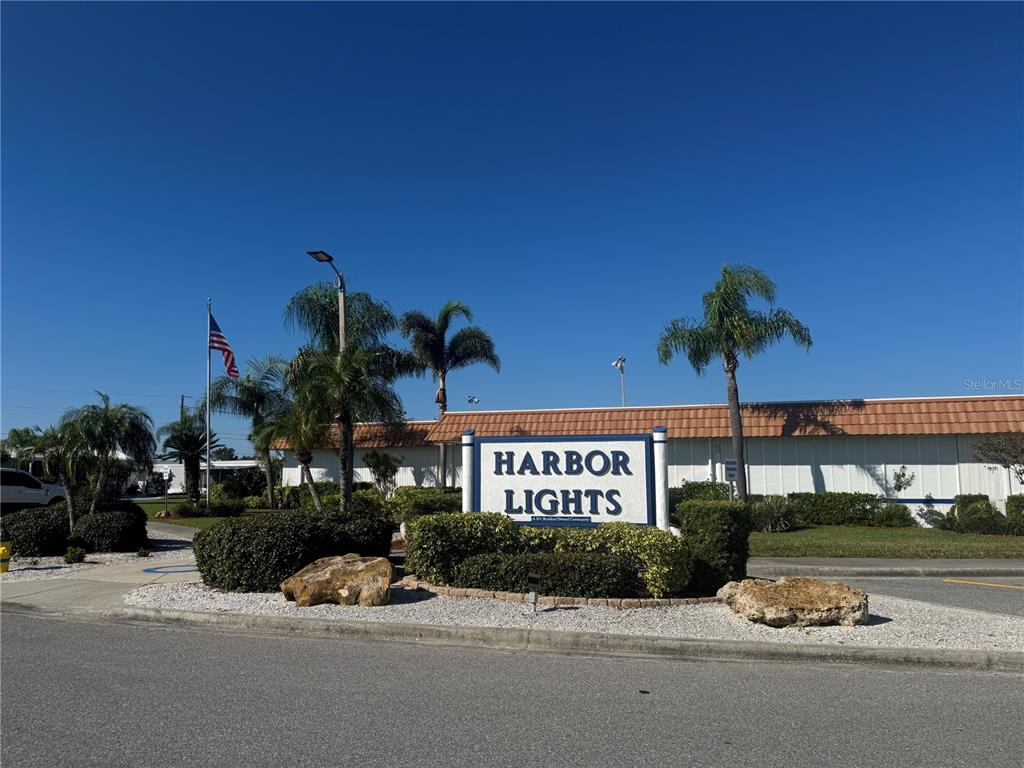 61 5th Avenue Venice, FL 34285 - Photo 35 of 35 a front view of a house with a yard and garage