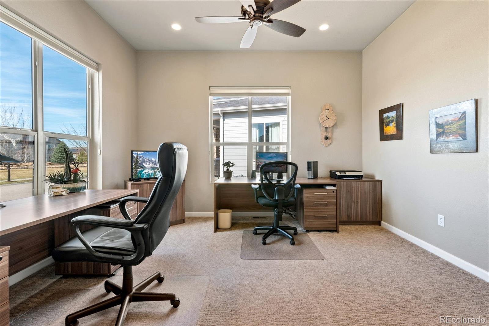 3044 Zephyr Road Fort Collins, CO 80528 - Photo 5 of 30 a view of a workspace with furniture and a window