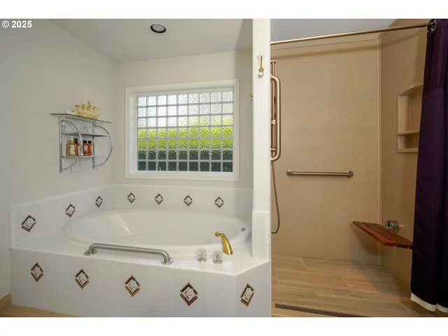 a bathroom with a sink a mirror and a bathtub