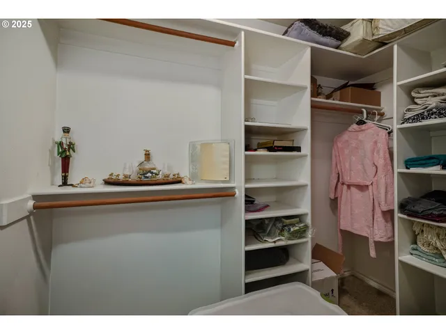 a living room with furniture large window and flat screen tv