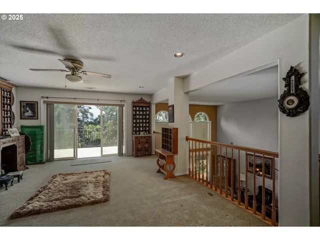 a view of a living room and kitchen