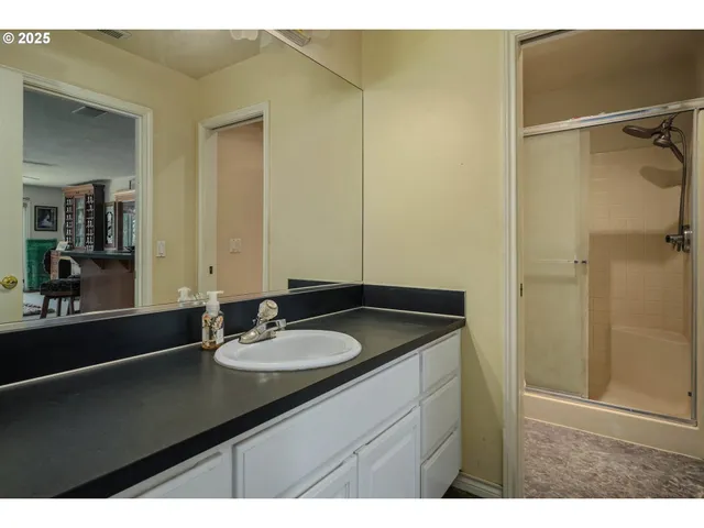 a view of a backyard of the house