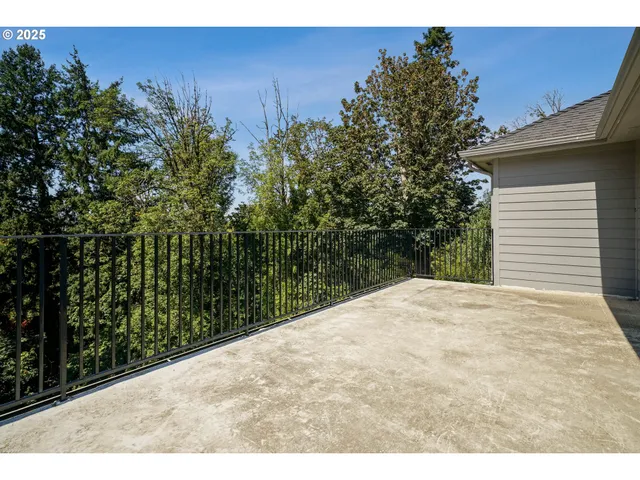 a balcony with an outdoor space
