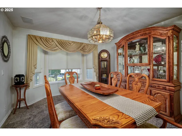 a view of a dining room with furniture