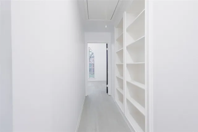 a bathroom with a double vanity sink mirror and