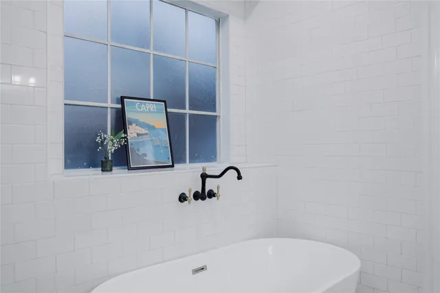 a bathroom with a bathtub