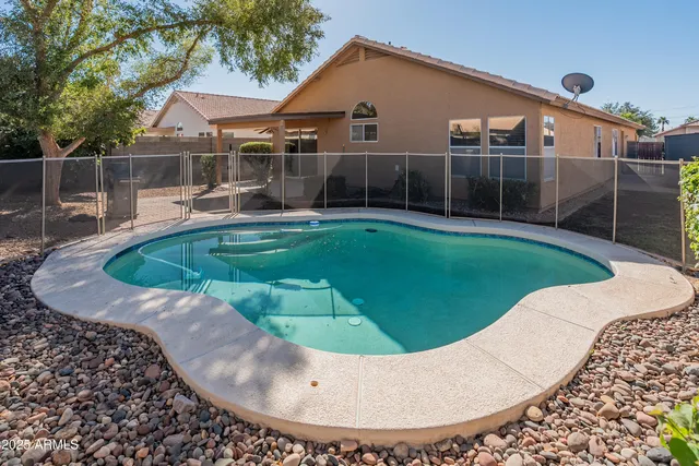 a view of a house with a swimming pool