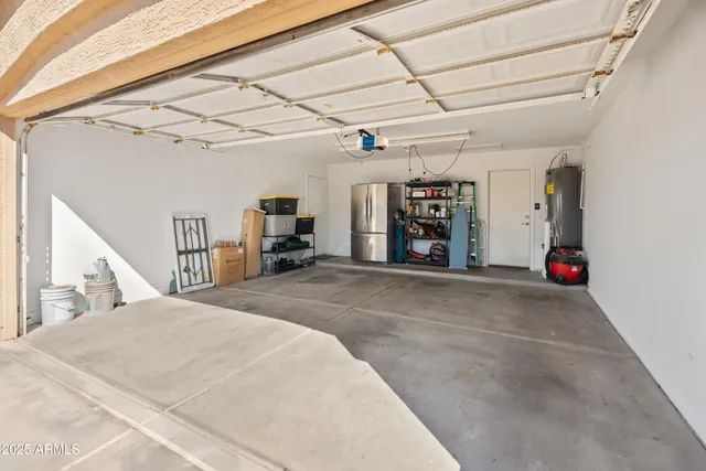 a view of a garage with refrigerator