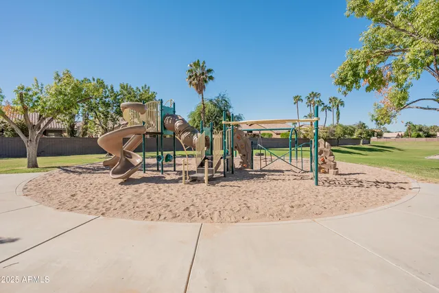 a view of a park with swings