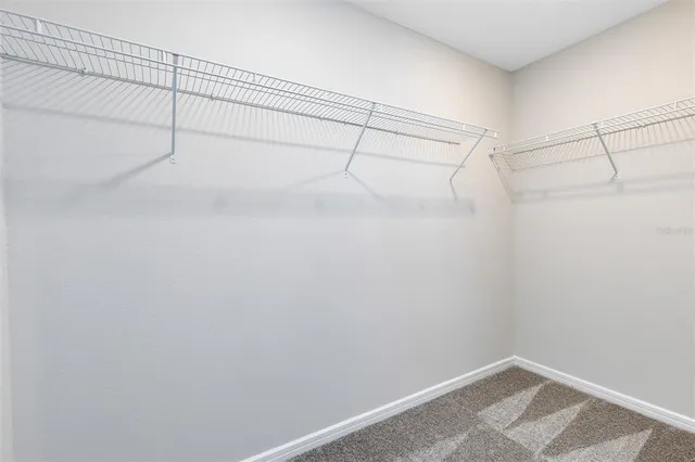 a view of a room with racks on the wall