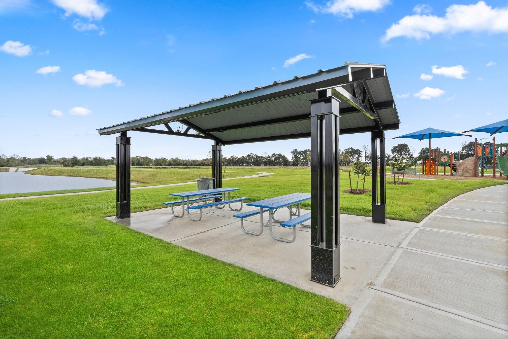 9015 Cedar Cres Drive Baytown, TX 77521 - Photo 24 of 26 a view of a patio with a table and chairs