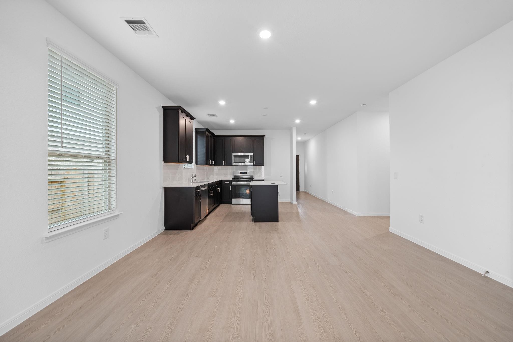 9015 Cedar Cres Drive Baytown, TX 77521 - Photo 6 of 26 a view of kitchen with a sink cabinets and window