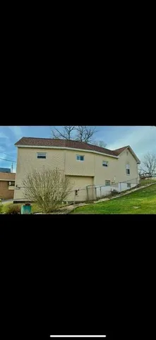 a kitchen view with a sink and a microwave