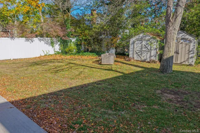 a view of yard with swimming pool