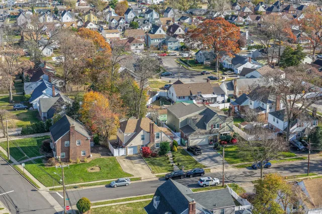 an aerial view of a city with lots of residential buildings