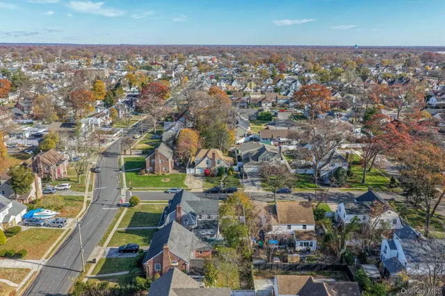 an aerial view of a city with lots of residential buildings