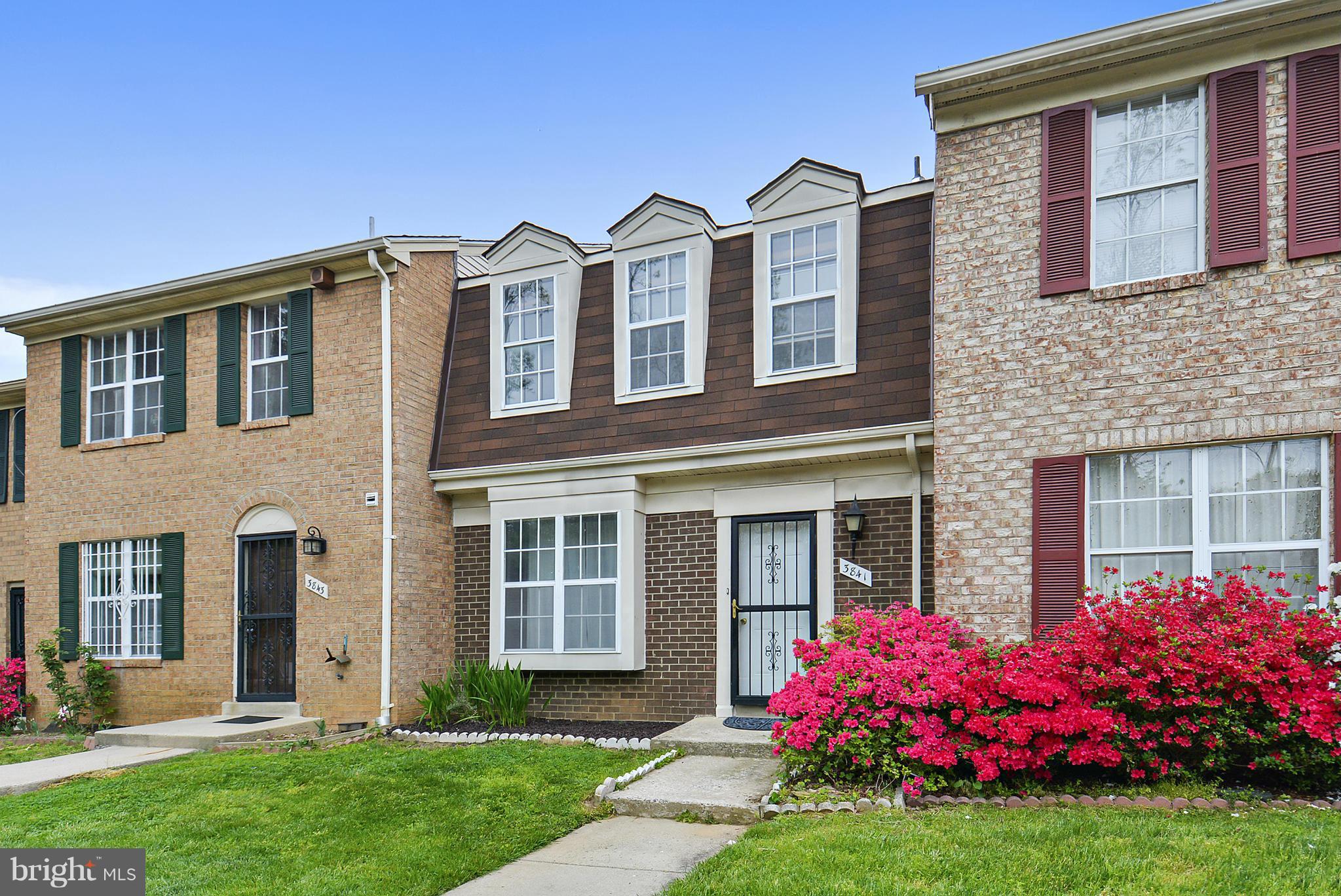 3841 Ferrara Drive Silver Spring, MD 20906 - Photo 1 of 30 a front view of house and yard with green space
