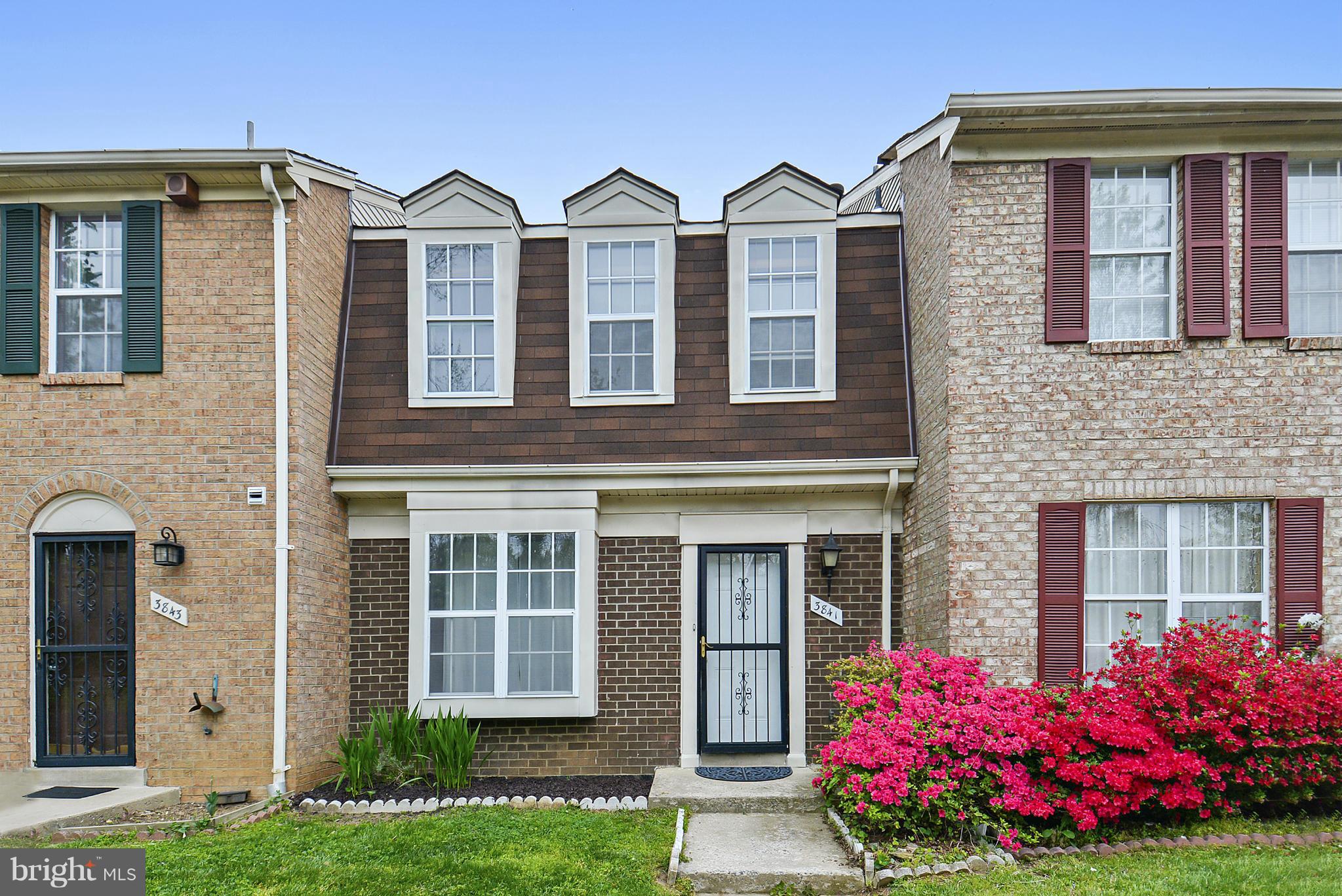 3841 Ferrara Drive Silver Spring, MD 20906 - Photo 2 of 30 front view of a house with a yard