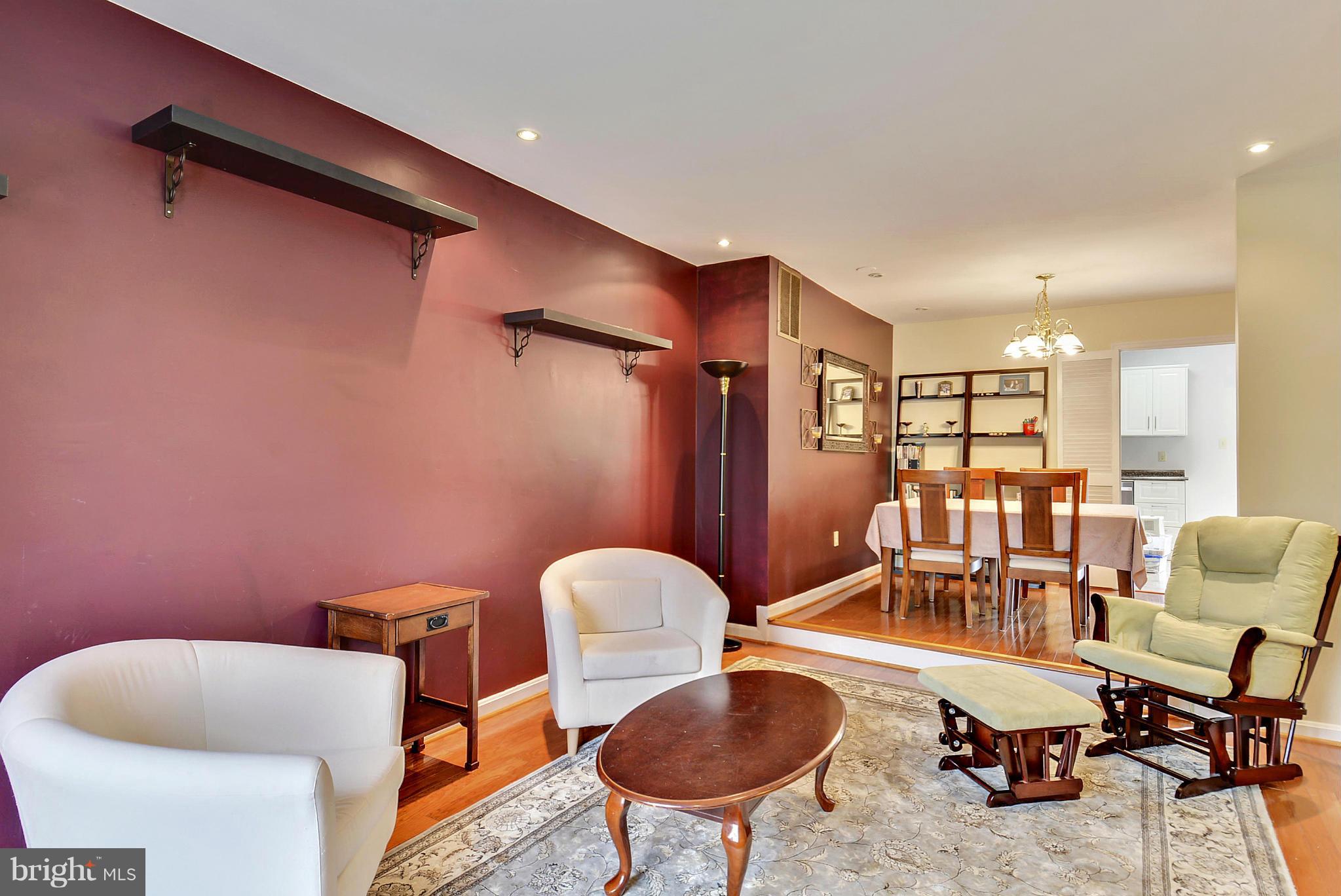 3841 Ferrara Drive Silver Spring, MD 20906 - Photo 11 of 30 a dining room with furniture and wooden floor