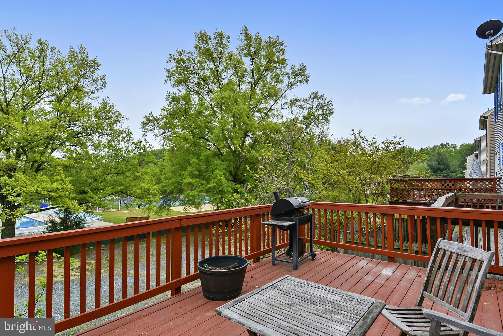3841 Ferrara Drive Silver Spring, MD 20906 - Photo 13 of 30 a view of a wooden deck with furniture