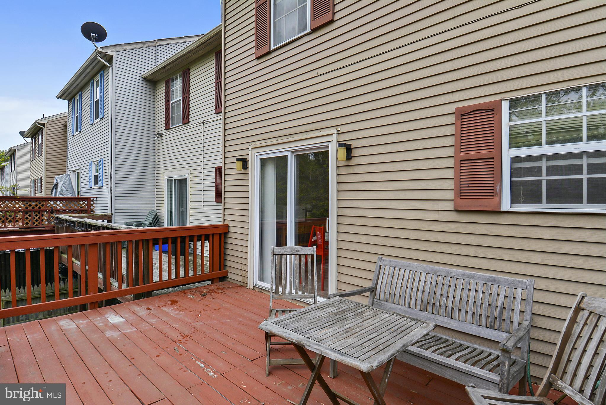 3841 Ferrara Drive Silver Spring, MD 20906 - Photo 15 of 30 a view of a house with wooden deck