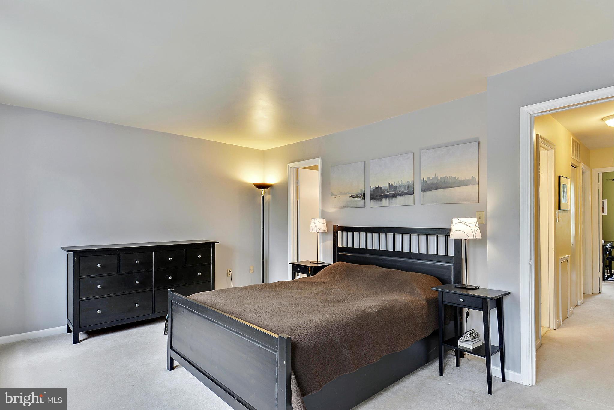 3841 Ferrara Drive Silver Spring, MD 20906 - Photo 22 of 30 a bedroom with a bed and a dresser