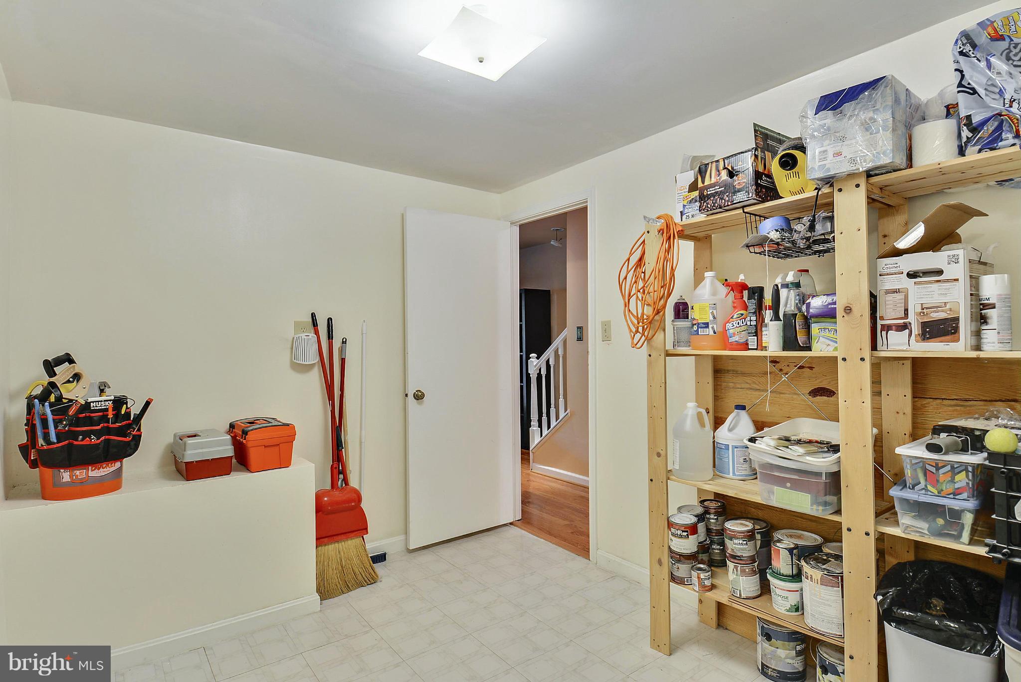 3841 Ferrara Drive Silver Spring, MD 20906 - Photo 23 of 30 a room with lots of different colored cloths