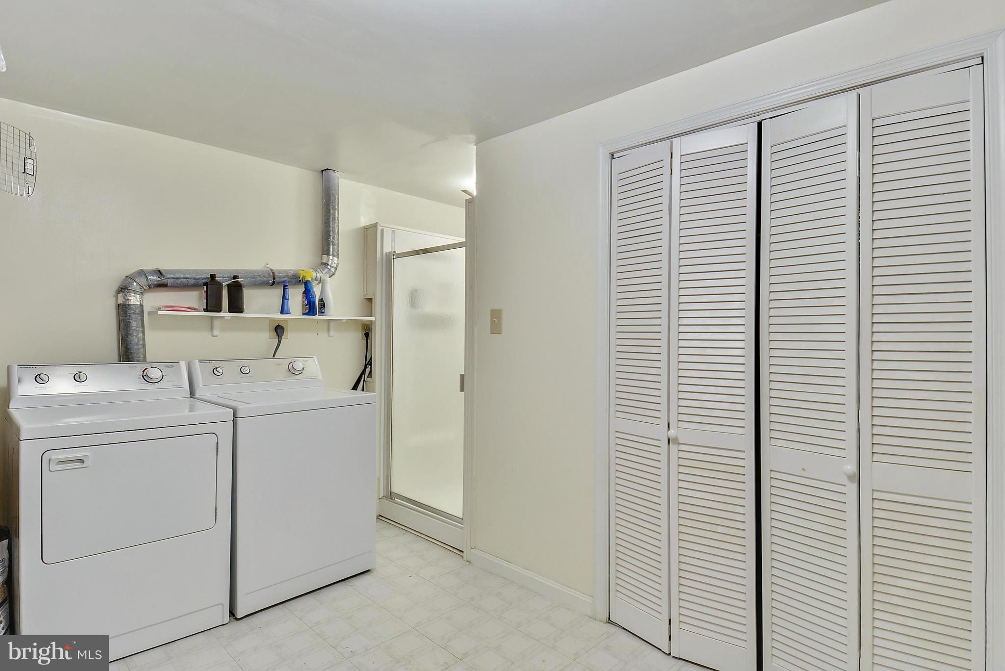 3841 Ferrara Drive Silver Spring, MD 20906 - Photo 25 of 30 a utility room with dryer and washer