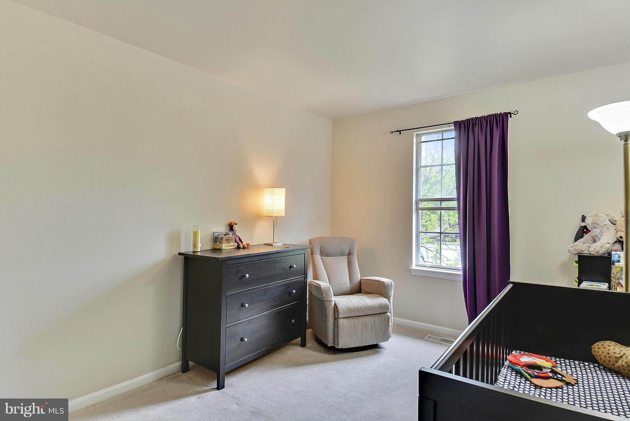 3841 Ferrara Drive Silver Spring, MD 20906 - Photo 27 of 30 a living room with furniture and a window