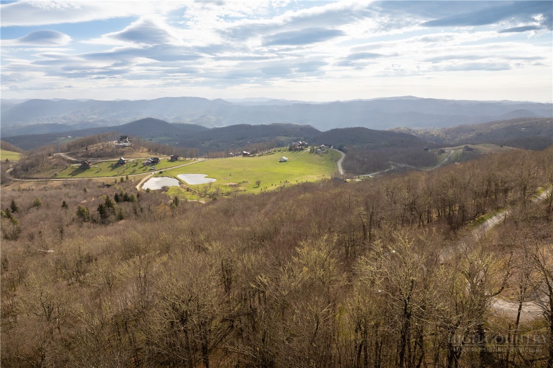 4 North Chappell Road Banner Elk, NC 28604 - Photo 12 of 14 a view of a lake with mountains in the background