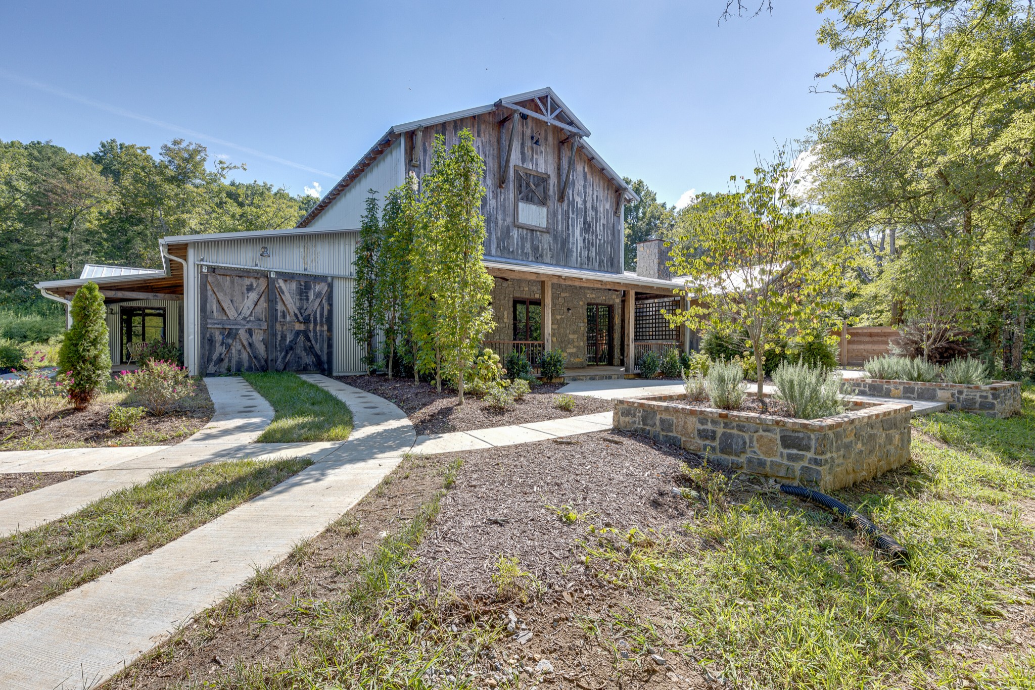 3235 Boyd Mill Pike Franklin, TN 37064 - Photo 1 of 68 a front view of a house with garden