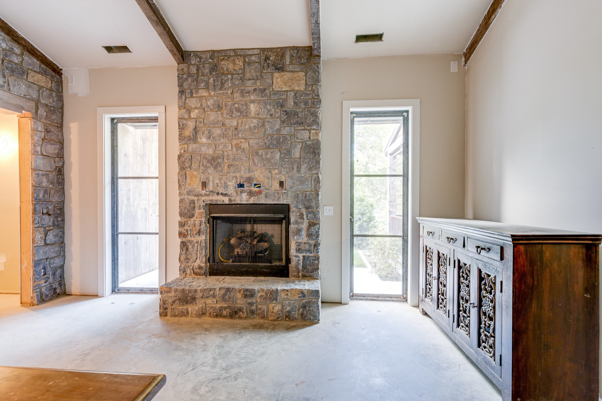 3235 Boyd Mill Pike Franklin, TN 37064 - Photo 12 of 68 a living room with furniture and a fireplace