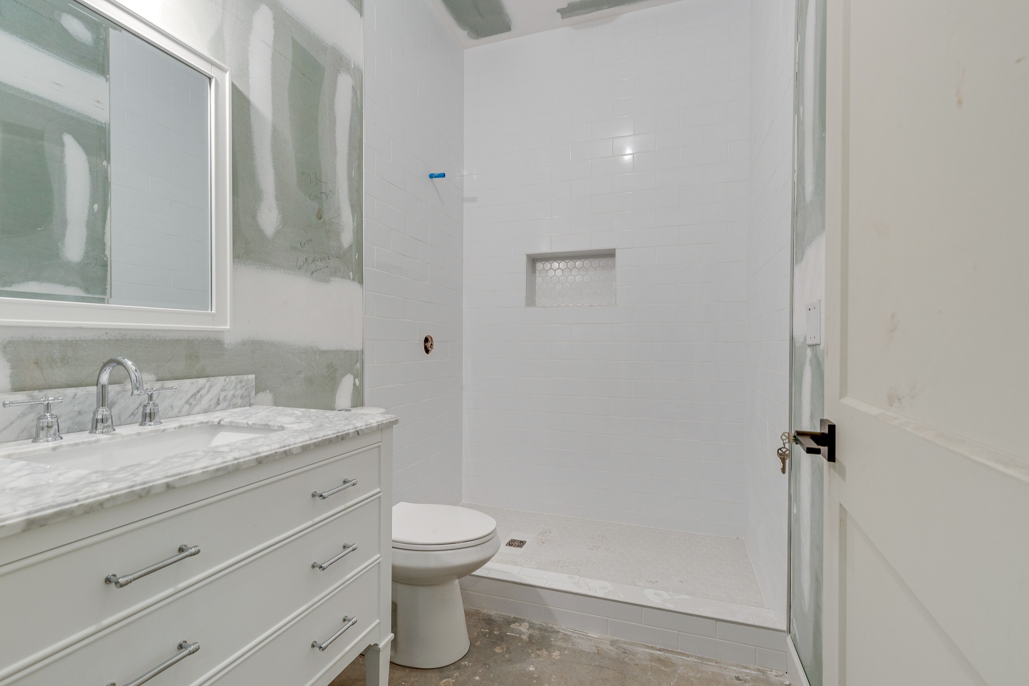 3235 Boyd Mill Pike Franklin, TN 37064 - Photo 22 of 68 a bathroom with a granite countertop sink toilet and shower