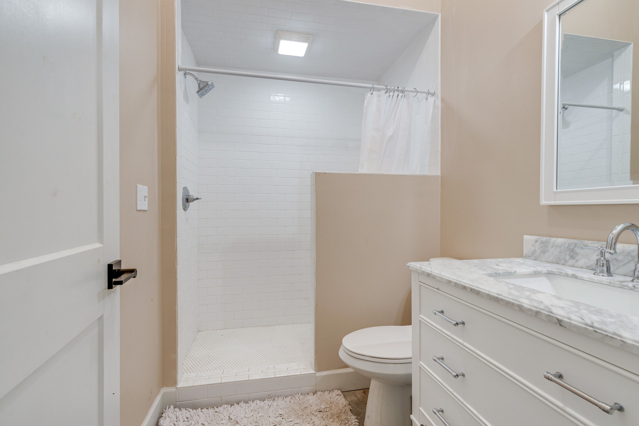 3235 Boyd Mill Pike Franklin, TN 37064 - Photo 25 of 68 a bathroom with a granite countertop sink toilet and shower