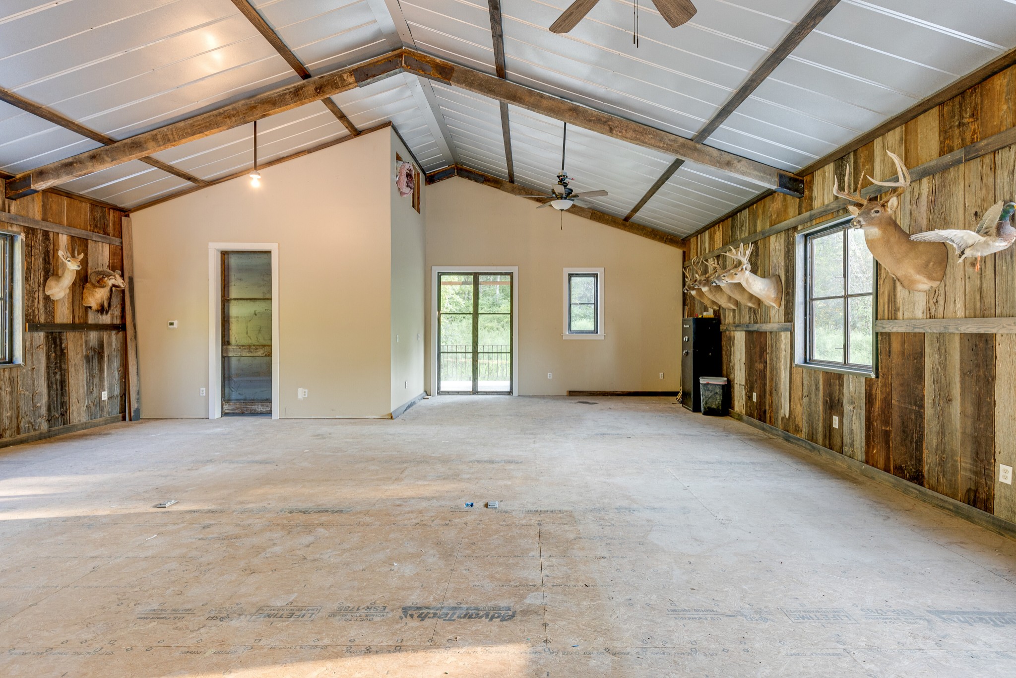 3235 Boyd Mill Pike Franklin, TN 37064 - Photo 28 of 68 Full bath off the large room upstairs. The back door leads to a covered porch with a set of stairs going down.