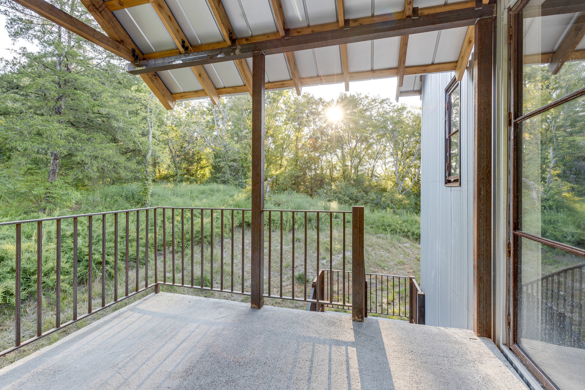 3235 Boyd Mill Pike Franklin, TN 37064 - Photo 30 of 68 a view of a room with wooden floor and a balcony