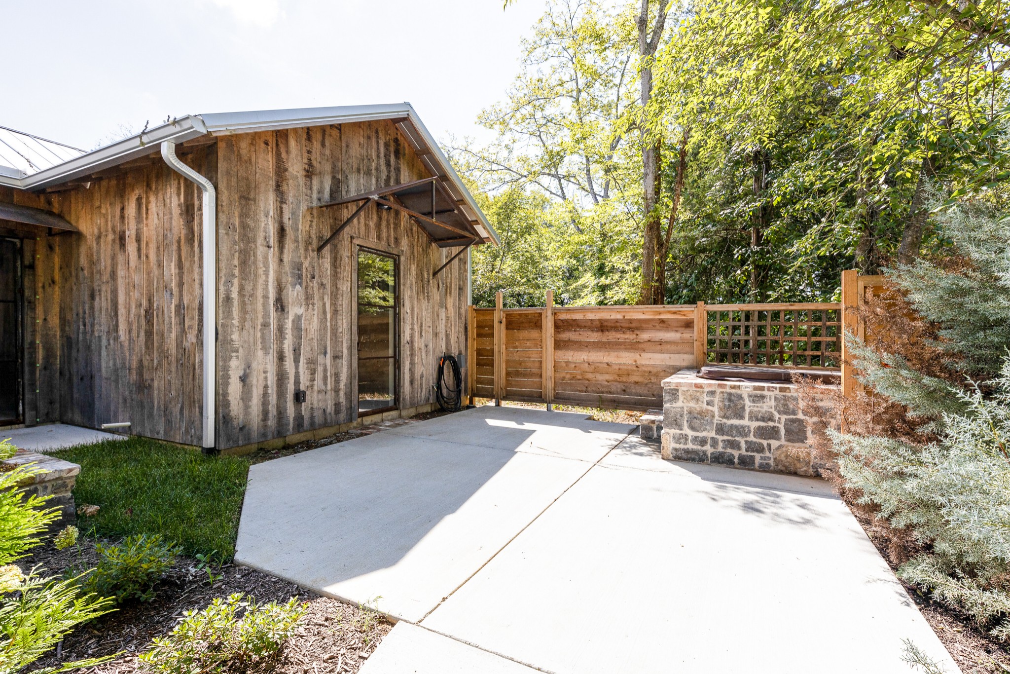 3235 Boyd Mill Pike Franklin, TN 37064 - Photo 32 of 68 a view of a back yard with a wooden fence