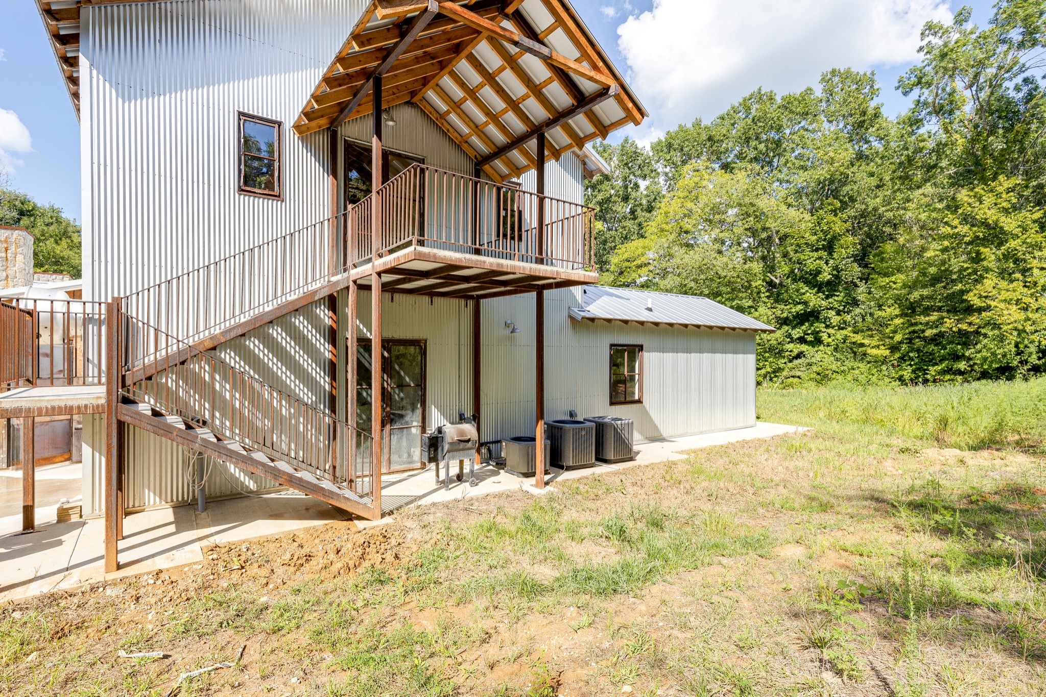 3235 Boyd Mill Pike Franklin, TN 37064 - Photo 38 of 68 a view of a house with backyard and sitting area