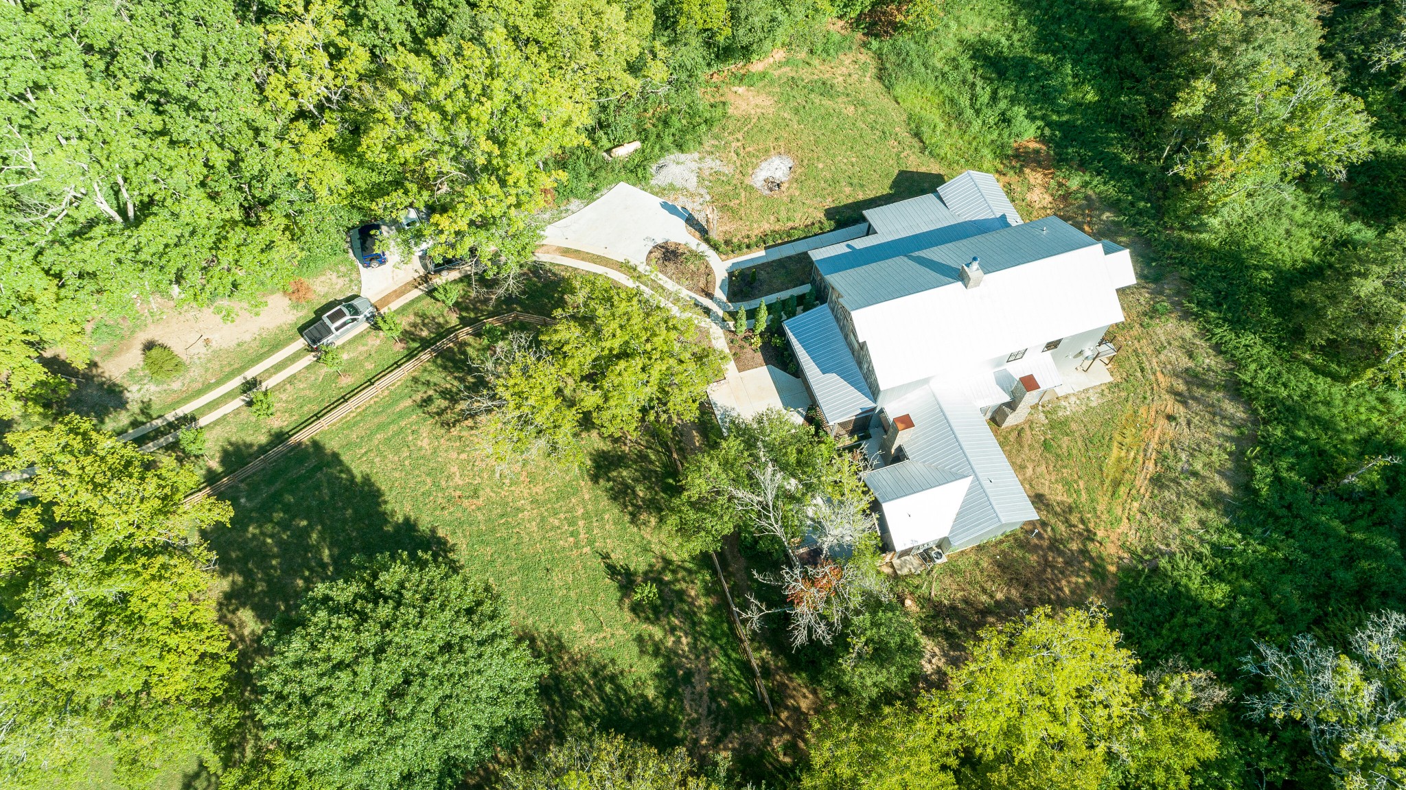 3235 Boyd Mill Pike Franklin, TN 37064 - Photo 47 of 68 an aerial view of a house with a yard and garden