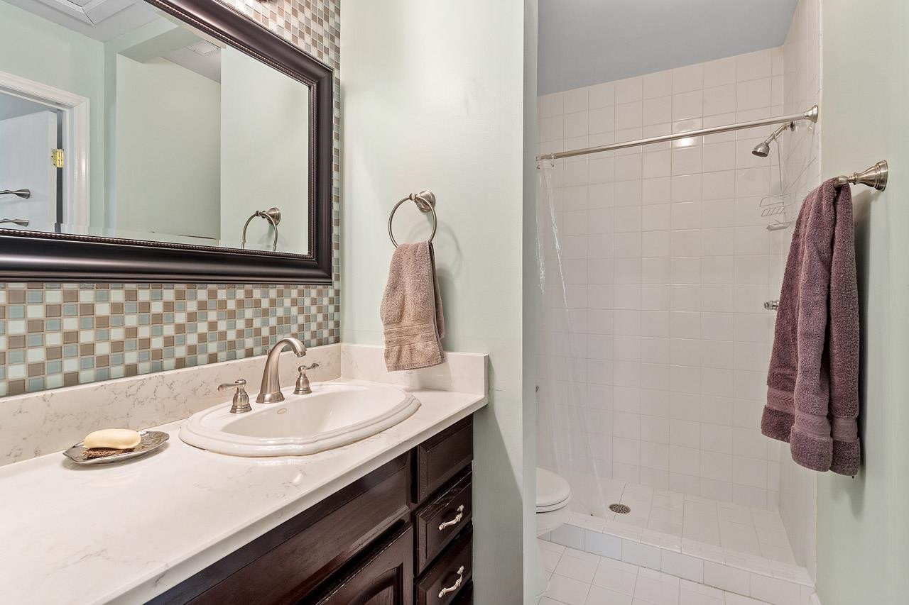 7819 Falcon Rest Circle, Unit END Raleigh, NC 27615 - Photo 36 of 38 Dual primary suites on the second level each have a private bath Master Bath/Spa