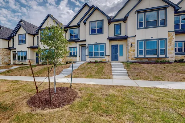 a house view with a garden space