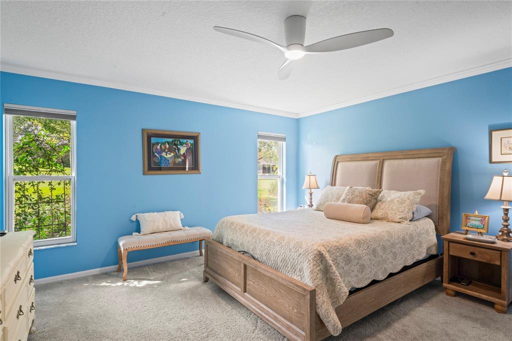 7112 Green Abbey Way Spring Hill, FL 34606 - Photo 23 of 66 a bedroom with a bed and a window