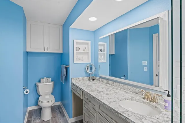 a kitchen with stainless steel appliances granite countertop a sink and dishwasher