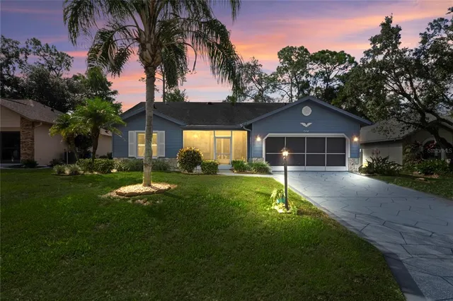 a view of a room with a furniture and garden