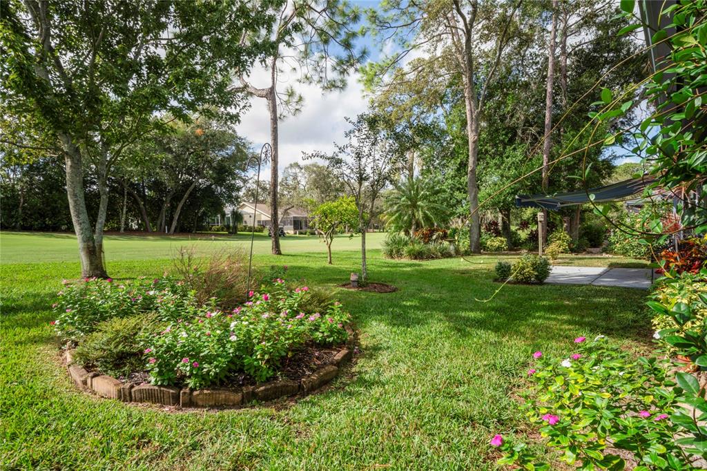 7112 Green Abbey Way Spring Hill, FL 34606 - Photo 40 of 66 a view of a park with large trees
